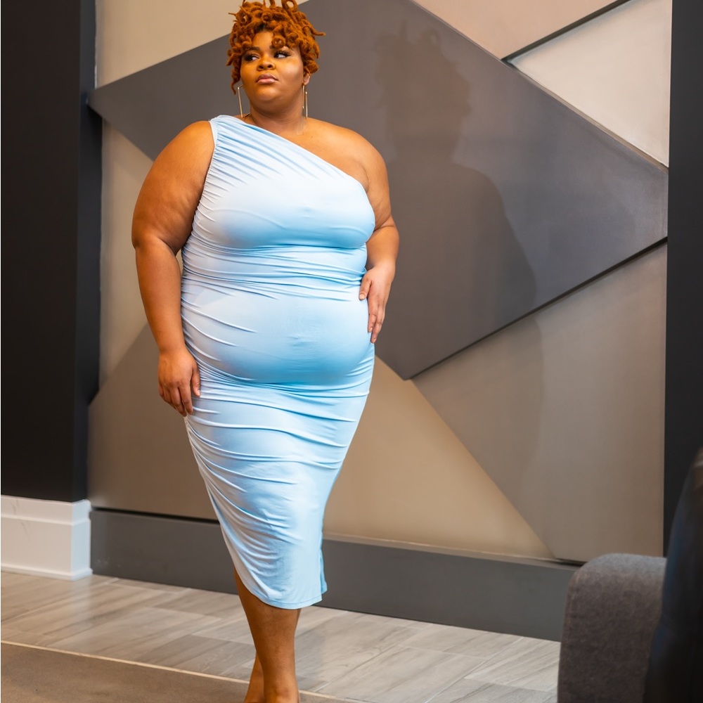 Blue ruched a symmetrical dress.